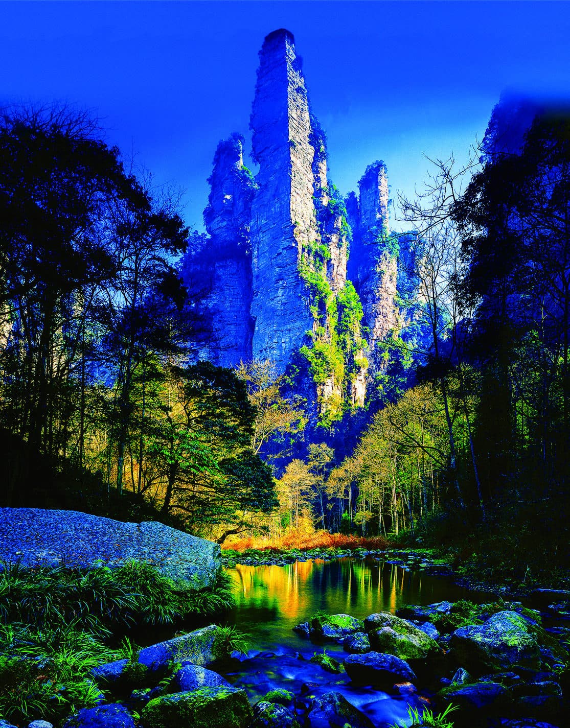 Golden Whip Rock rising above the valley