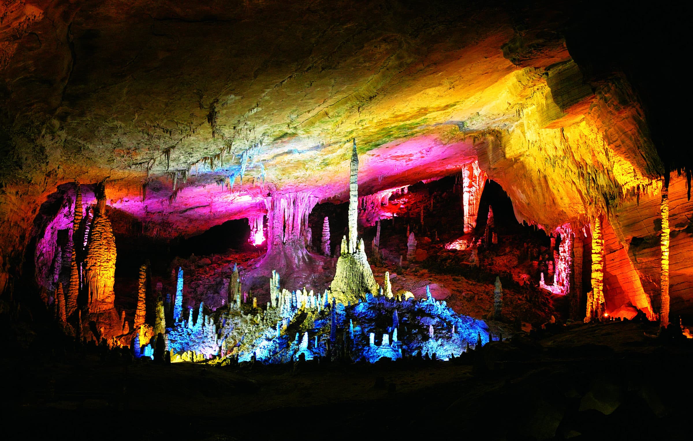 Official photograph of illuminated formations inside Yellow Dragon Cave